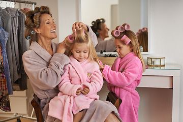 Image showing Hairstyle, home and grandmother with girls, fun and holiday with vacation and grooming. Family, dress up and granny with grandchildren or playing with joy and relaxing with equipment or weekend break