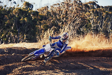 Image showing Person, professional motorcyclist and dirt track for competition, extreme sports or outdoor race. Expert rider on motorbike or scrambler for sand course, challenge or off road rally track in nature