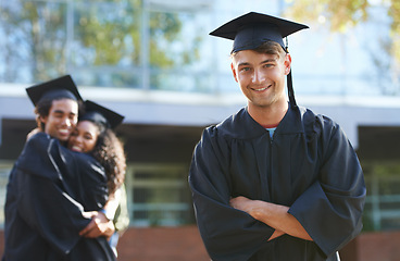 Image showing Graduation, friends and portrait of man at university for learning, studying and knowledge on campus. Education, academy and men and woman outdoors for celebration, graduate ceremony and college