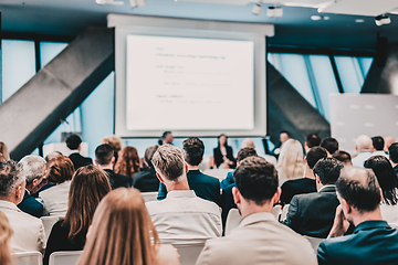 Image showing Round table discussion at business conference meeting event.. Audience at the conference hall. Business and entrepreneurship symposium.