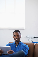 Image showing Man, tablet and relax in portrait at home, subscribe and internet for web or blog. Black male person, smile and streaming entertainment on couch, mockup space and app for online shopping on weekend