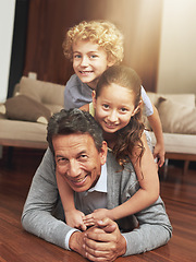 Image showing Portrait, home and grandfather on the ground, grandchildren and happiness with siblings or vacation. Face, apartment or elderly man with grandkids or bonding together with fun or playing with holiday