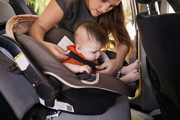 Image showing Mom, baby and car seat in motor vehicle for child safety with buckle or strap. Mother, infant and protection, travel and parenting for secure transport to fasten or latch with love and harness