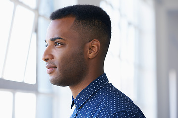 Image showing Businessman, thinking and planning by window with vision for future dream, startup and company. Black male person, ideas and standing at building opening with thoughts for growth, career and work