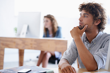 Image showing Creative, coworking space and man at desk thinking, brainstorming or planning project in office. Relax, ideas or professional designer with inspiration, reflection or insight at architecture business