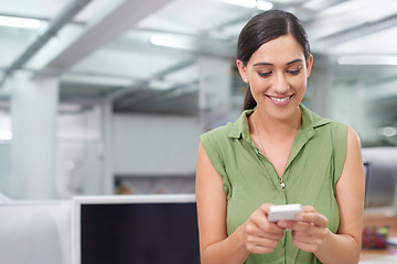 Image showing Business woman, typing and networking on phone, smile and planning or communication in email. Female person, office and app for conversation on mockup space, web and internet for research or info