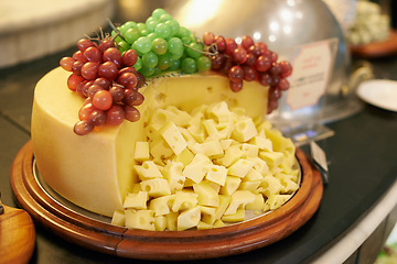 Image showing Food, grapes and cheese in restaurant buffet for catering service, snack selection and banquet for eating. Cafeteria, fine dining and closeup of table for lunch, supper and dinner event for wellness