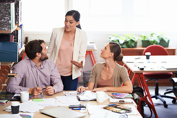 Image showing Group of colleagues, paper and brainstorming for presentation, creative and project planning. Workers, talking and documents for teamwork, ideas and solutions for strategy and collaboration in office