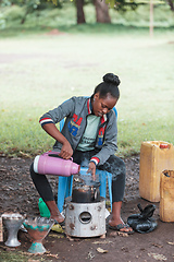 Image showing Ethiopian traditional Coffee ceremony, crafting street bunna coffee, Southern Nations Etiopia