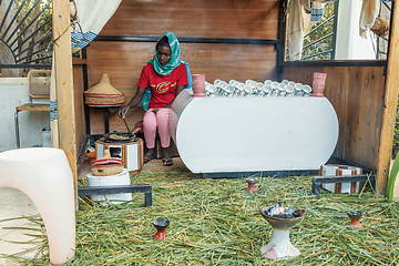 Image showing Ethiopian traditional Coffee ceremony, crafting street bunna coffee, Ziway Etiopia