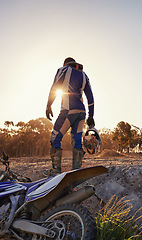Image showing Motorcycle, sports and danger with back view of biker person outdoor, sunlight with uniform for riding on dirt track. Speed, power and risk with motorbike, transportation and adventure for adrenaline