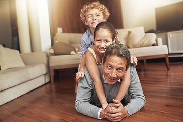 Image showing Portrait, home and grandfather on the floor, grandkids and happiness with stack and holiday. Face, apartment and elderly man with grandchildren or bonding together with love and playing with siblings