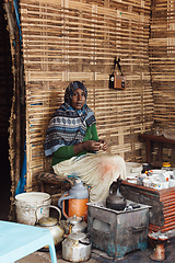 Image showing Ethiopian traditional Coffee ceremony, crafting street bunna coffee, Oromia Region Etiopia