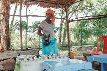 Image showing Ethiopian traditional Coffee ceremony, crafting street bunna coffee, Southern Nations Etiopia