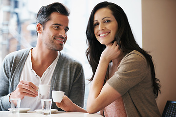 Image showing Love, portrait and couple with coffee on date for romance or anniversary in cafeteria. Happy, bonding and young man and woman talking and drinking latte, espresso or cappuccino at restaurant.