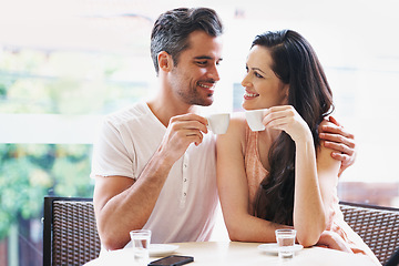 Image showing Date, coffee and couple at cafe with happy, smile and love together with toast and hot drink at a table. Espresso, morning and marriage at a restaurant with bonding, care and romance on patio