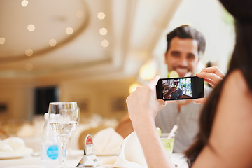 Image showing Restaurant, couple taking picture and food with love and digital app with social media or happy. People, man and woman with smartphone or photograph with influencer or cafe for Valentines day or date