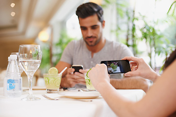 Image showing Restaurant, screen and couple taking picture, food and lunch with digital app and photograph. People, date or couple with cellphone or influencer with social media or love with Valentines day in cafe