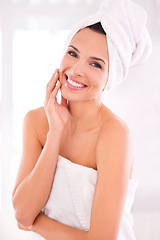 Image showing Hair towel, portrait and woman with skincare for dermatology, health and shower in bathroom with smile. Beauty, treatment and female person with happiness for wellness, cosmetics and morning routine