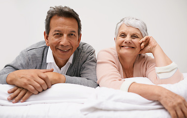 Image showing Portrait, senior or happy couple in bed to relax in home or house for bonding or support together. Retirement, morning or face of a man with an elderly woman with smile, love or care in marriage
