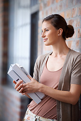 Image showing Woman, paperwork and thinking at wall for research project for planning thoughts or brainstorming, document or entrepreneur. Female person, files and wondering at office for proposal, vision or idea