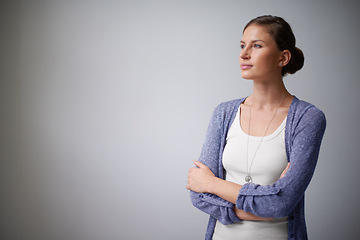 Image showing Space, designer or woman thinking in studio with arms crossed, creative plan or confidence. Brainstorming, employee or proud entrepreneur with vision or ideas or mockup isolated on grey background