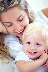 Image showing Portrait, mom and baby bonding in home with smile, support and quality time with happy family wellness. Relax, mother and face of toddler son with love, growth and child development in apartment.