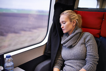 Image showing Woman, train and sleep with travel or relax journey for holiday destination for tired, transportation or resting. Female person, window and commute in Canada with nap for peace, comfortable or trip