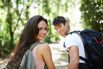 Image showing Walking, forest or portrait of happy couple in nature or wilderness on a trekking adventure. Man, woman or back of people hiking in natural park or woods for exercise or wellness on holiday vacation