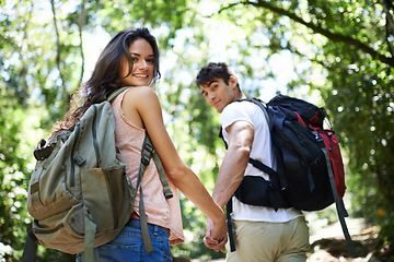 Image showing Travel, hiking and portrait of couple holding hands for adventure, freedom and walking outdoors. Forest, nature and happy man and woman backpacking for holiday, vacation and trekking for wellness