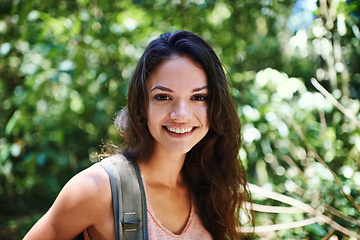 Image showing Nature, hiking and portrait of woman in forest with backpack for outdoor adventure trail on vacation. Smile, travel and person with bag for trekking in woods on holiday or weekend trip in Canada.