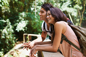 Image showing Nature, hiking and couple in forest with view for adventure, smile and explore woods for wellness. Dating, travel and man and woman on trail for outdoor holiday, vacation or trekking for exercise