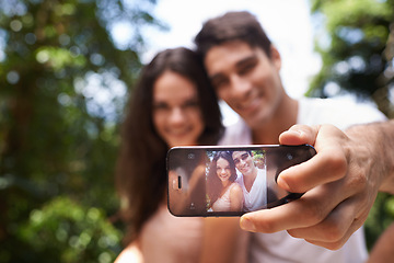 Image showing Couple, selfie and phone screen for hiking in forest with smile for memory, post and web blog. Man, woman and profile picture for trekking, direction and jungle on app for social media in Colombia