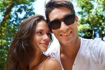 Image showing Happy, love and portrait of couple in park for bonding, relationship and relax outdoors together. Nature, dating and man and woman on holiday, vacation and weekend for travel, wellness and adventure