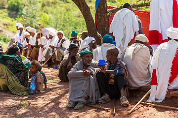 Image showing Orthodox christian Ethiopian people behind famous rock-hewn church, Lalibela Ethiopia people diversity,