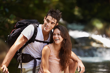 Image showing Happy, nature and couple by river for hiking, trekking and adventure for wellness, relax and explore forest. Dating, love and man and woman on holiday, vacation and freedom on weekend for exercise