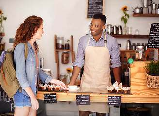 Image showing Coffee, startup and barista serving customer in bakery, cafe or deli for small business retail or food industry. Small business, smile or bistro and man server in restaurant with woman consumer