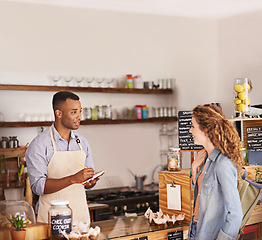 Image showing Woman, coffee shop and waiter with writing at counter for shopping, purchase and lunch at cafe. Female person, small business and barista with notepad for discussion, order and customer service