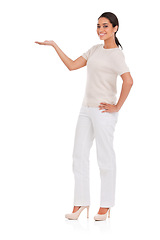 Image showing Woman, hand and presentation in studio for marketing, promotion and mockup space on a white background. Professional worker, person or model in portrait with palm for advertising, offer or choice