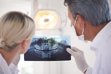 Image showing Dental, care and team checking x ray with man, woman and professional opinion for consultation from back. Dentist, technician and healthcare of mouth for gums, teeth and expert advice on toothache.