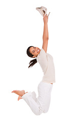 Image showing Fashion, jump and portrait of happy woman in studio with news, sale or shoes discount on white background. Wow, energy or female model with deal celebration, success or retail, shopping or mall promo