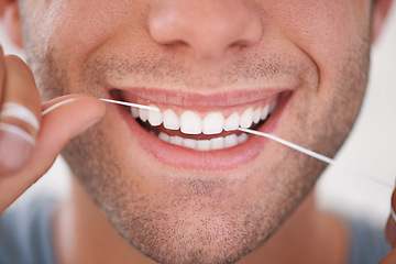 Image showing Dental, floss and closeup of man with teeth whitening, fresh breathe and cavity prevention for health and hygiene. Oral care, string or thread for orthodontics with veneers and mouth cleaning