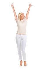 Image showing Woman, winner and arms up in studio for success, winning and achievement with fashion, bonus or sale. Excited person in heels and stylish clothes with yes, wow and celebration on a white background