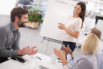 Image showing Presentation, clapping and business woman with whiteboard, company vision or proposal for team. Female leadership, audience and coworkers applause for ideas, discussion or planning in boardroom