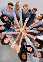 Image showing Hands together, team and top of people in circle for mission, support in solidarity and respect in portrait. Trust, help and loyalty for collaboration, meeting at startup with diversity and inclusion