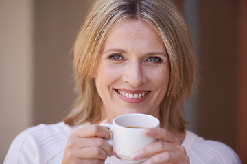 Image showing Portrait, happy and mature woman with coffee for morning, ambition or fresh cup of tea to start the day. Face of female person with smile, beverage or latte for caffeine drink at cafe or restaurant