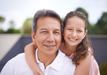 Image showing Outdoor, portrait and girl hug grandpa on summer, holiday or vacation together in retirement with love. Senior, man and grandparent relax with child in backyard, garden or embrace in Mexico with care