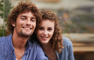 Image showing Happy, smile and portrait of couple at coffee shop on romantic, anniversary or morning date. Love, positive and young man and woman bonding at cafeteria or restaurant for cappuccino together.