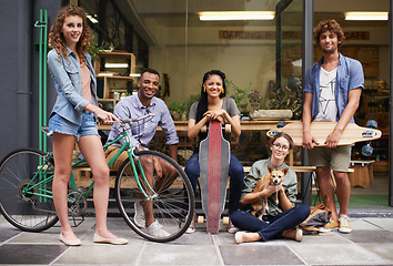 Image showing Bike, skateboard and portrait of urban friends on sidewalk together with smile, diversity and bonding. City, gen z style and group of people with street fashion, positive attitude and happy culture.