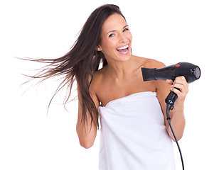 Image showing Woman, portrait and blow dryer and hair treatment in studio with salon tool with towel for morning routine, white background or style. Female person, equipment and heat for beauty, texture or mockup